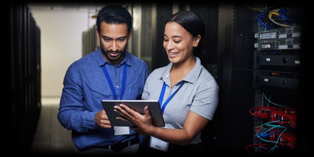 Two business people looking at a tablet together